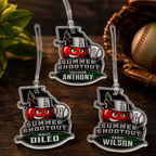 Three personalized 'Summer Shootout' keychains on a wooden surface with a baseball and glove in the background.
