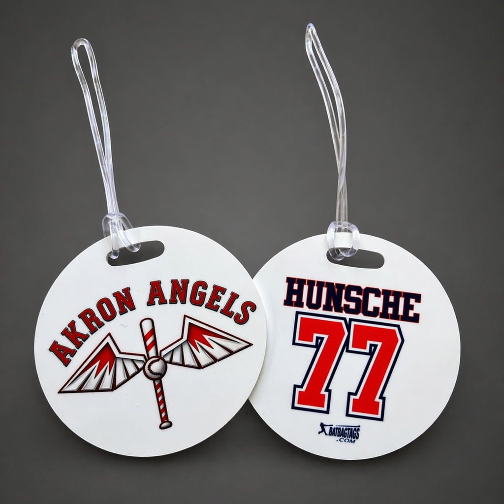 Two round tags with 'Akron Angels' and 'Hunsche 77' text on a dark background